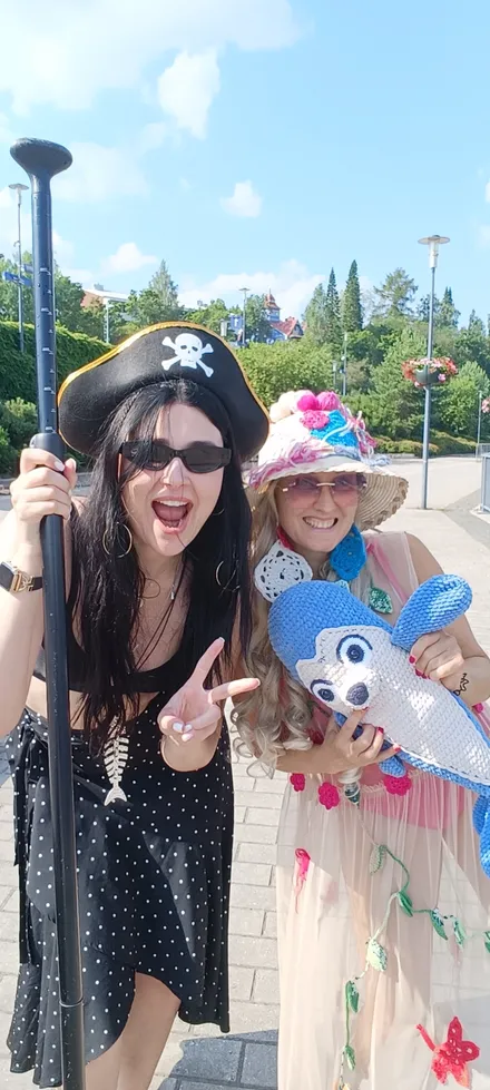 two smiling festival participants on their SUP boards